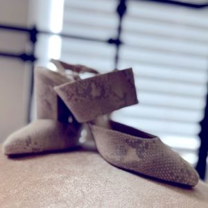 Casually sophisticated sling back stacked heels